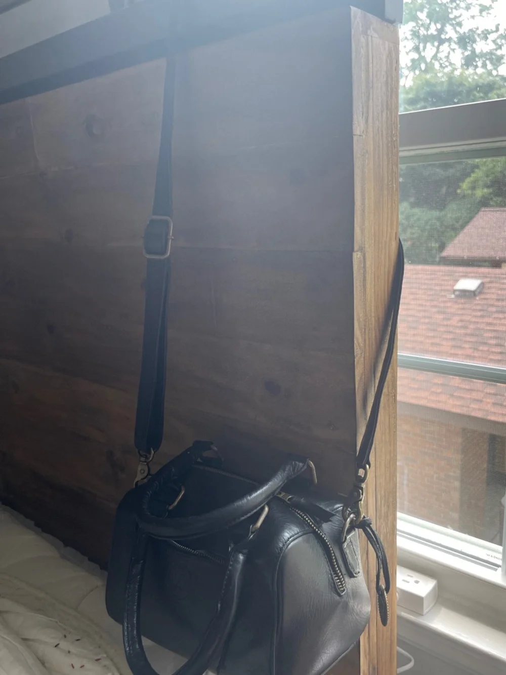 Black Leather Satchel with Top Handles and Crossbody Strap